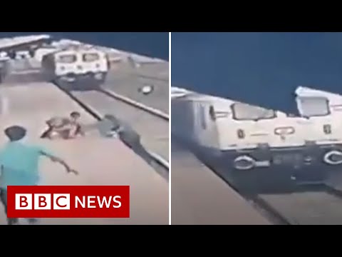 CCTV shows Indian rail worker risk life to save child from train – BBC News