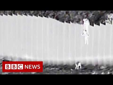 Children dropped over US border wall – BBC News