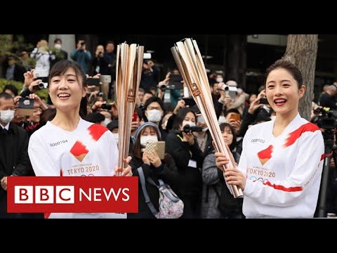 Japan warns fans not to cheer during Olympics to prevent Covid surge – BBC News