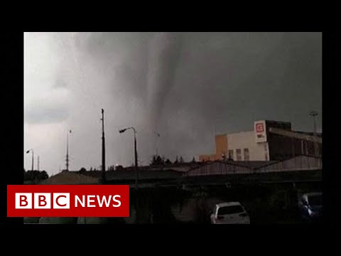 Tornado fells trees then smashes eyewitness’s window – BBC News