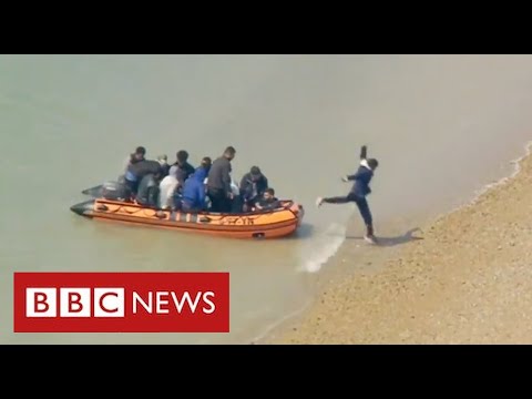 Record number of migrants cross English Channel on a single day – BBC News