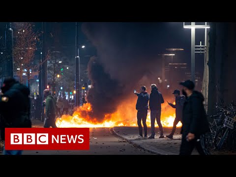 Dutch police clash with anti-lockdown rioters – BBC News