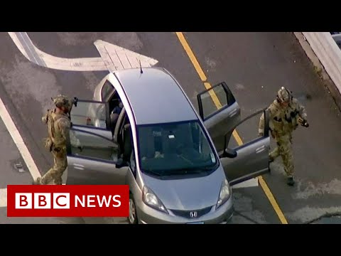 Suspect arrested over US mass shooting at 4 July parade – BBC News