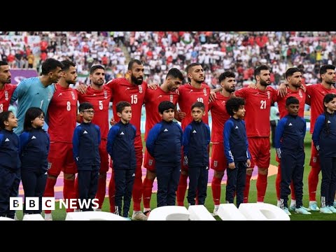 Iran football players decline to sing national anthem at World Cup match – BBC News