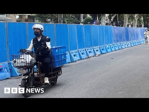 China police install barriers in Shanghai in effort to curb Covid protests – BBC News