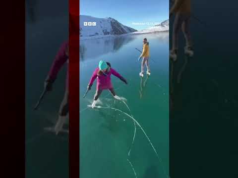 An ice rescue instructor and his wife skated on a rare ‘ice-window’ in Alaska. #IceSkating #BBCNews