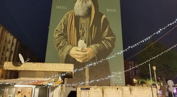 Sinergia Amg Energia-Comune Palermo, illuminato murale di Biagio Conte