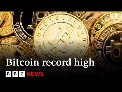 Bitcoin races to record high as big US investors pile in | BBC News