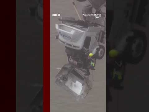 Woman rescued from truck dangling off bridge in Kentucky. #Shorts #Rescue #BBCNews