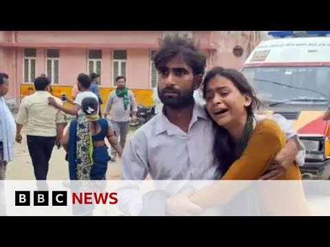 At least 100 killed in crush at India religious event | BBC News